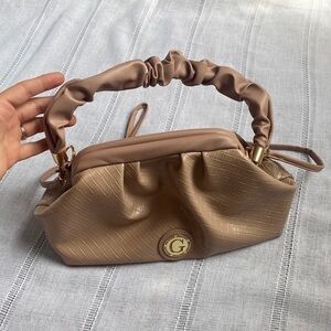 Giselle Paris “Kathryn” basketweave shoulder bag in dusty rose.